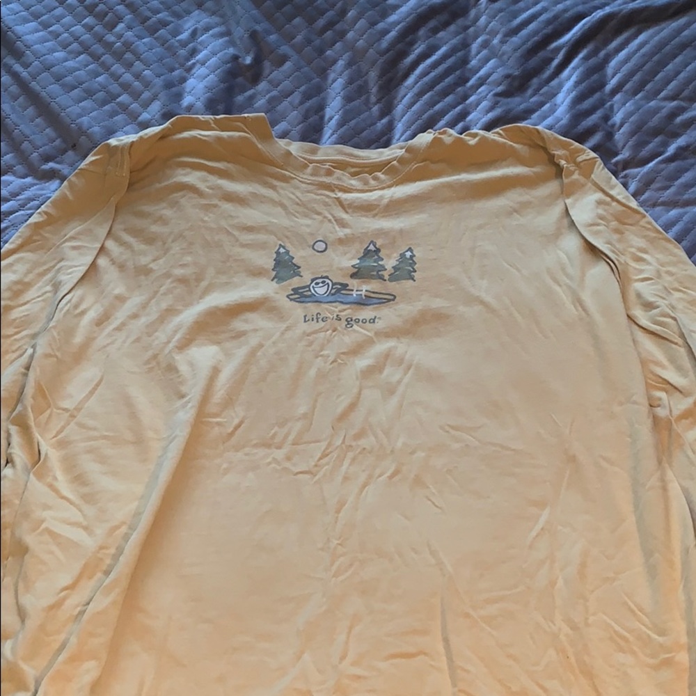 yellow ‘life is good’ shirt